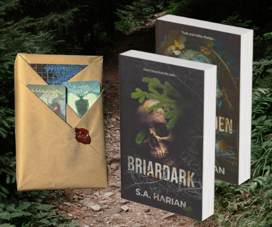 Briardark and Waywarden with dark covers featuring a skull and greenery, one wrapped in gold paper.