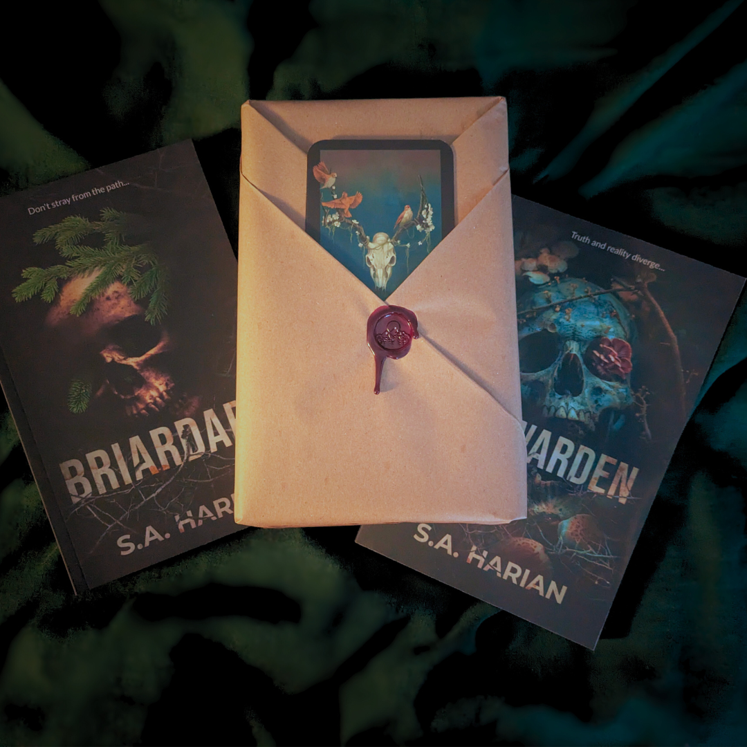 Decorative package with a wax seal on top of two books titled 'Briardark' and 'Waywarden' by S.A. Harian.